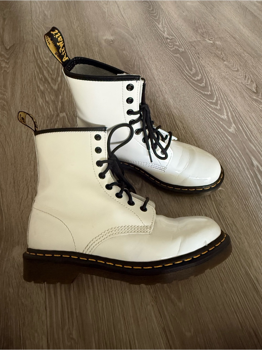 White Dr. Martens Leather Lace-Up Combat Boots with Black Trim